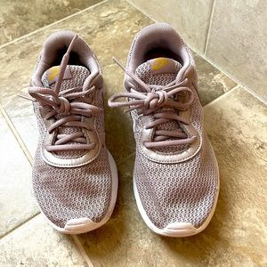 Lavender colored Nike shoes